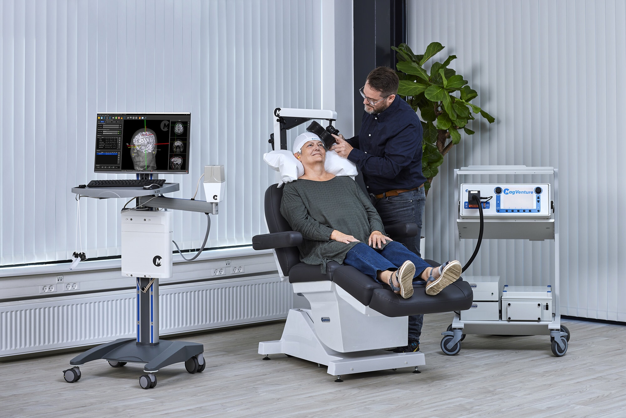 Patient getting TMS Treatment with a R30 and using Atlas Neuro Navigation 3